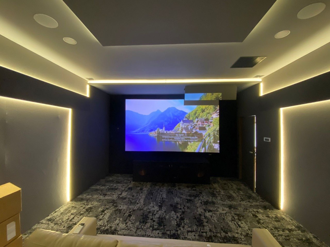 Projector installation — motorised screen with 4K projection